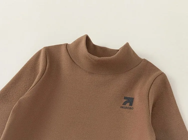 Arrow Turtleneck Long Sleeve Top